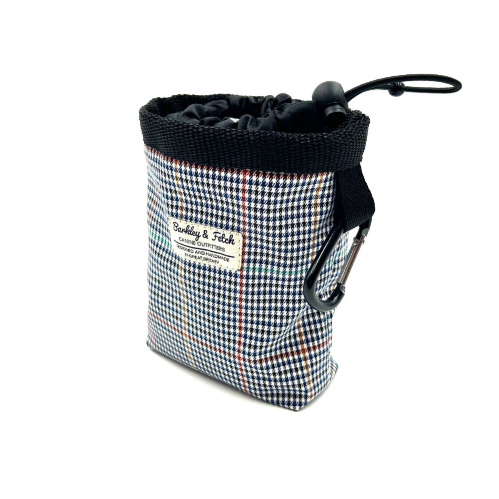 Small pouch with a checkered pattern and black drawstring on a white background