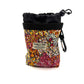 Colorful patterned pouch with black drawstring and carabiner on a white background