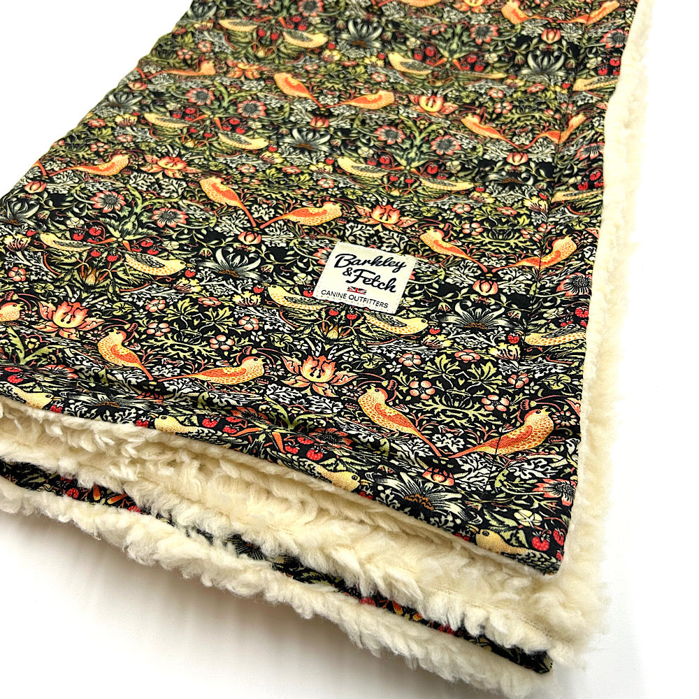 Floral patterned William Morris dog blanket with white sherpa lining on a white background handmade in UK by Barkley And Fetch