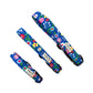 Set of floral-patterned dog collars and leashes on a white background