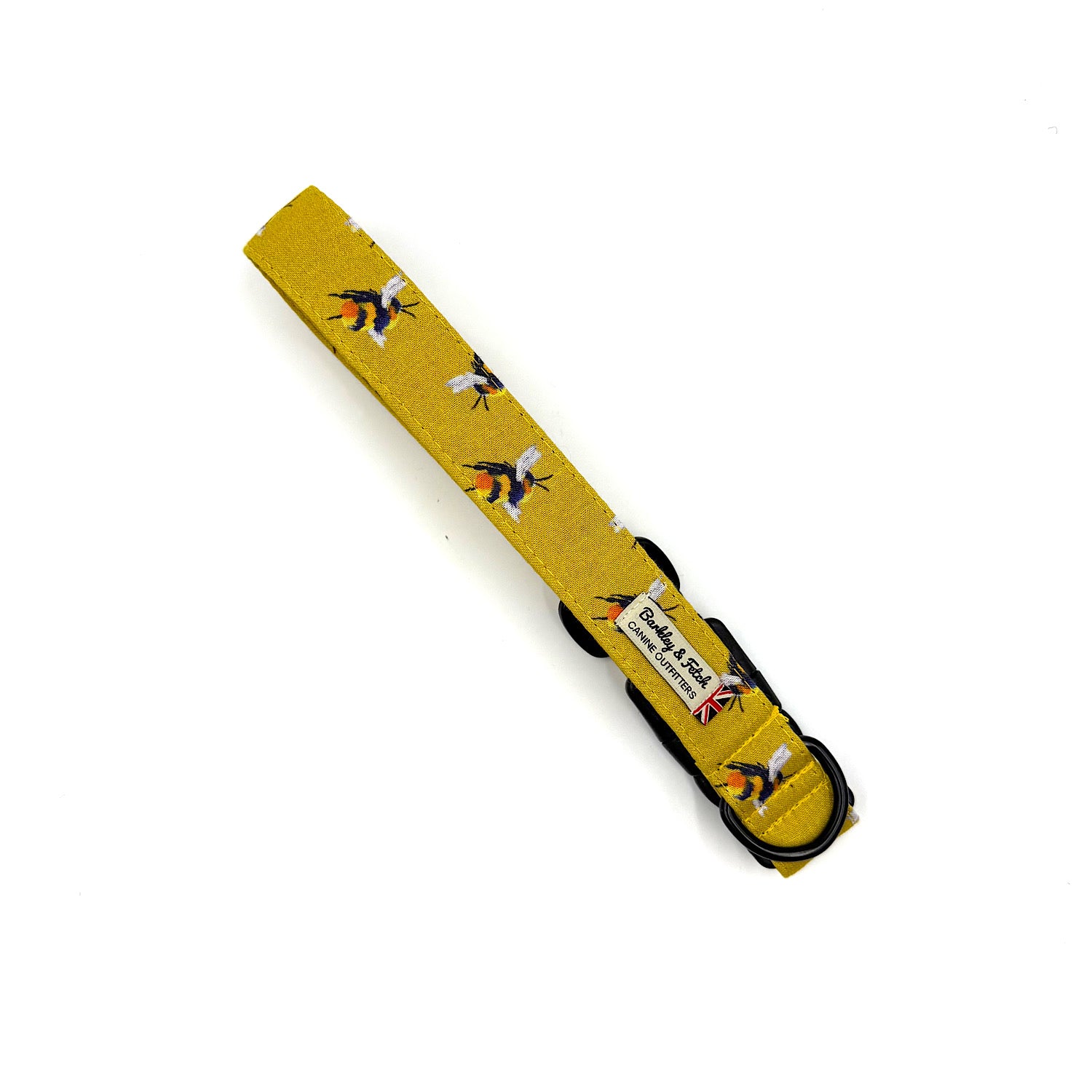 Yellow dog collar with black and white pattern on a white background