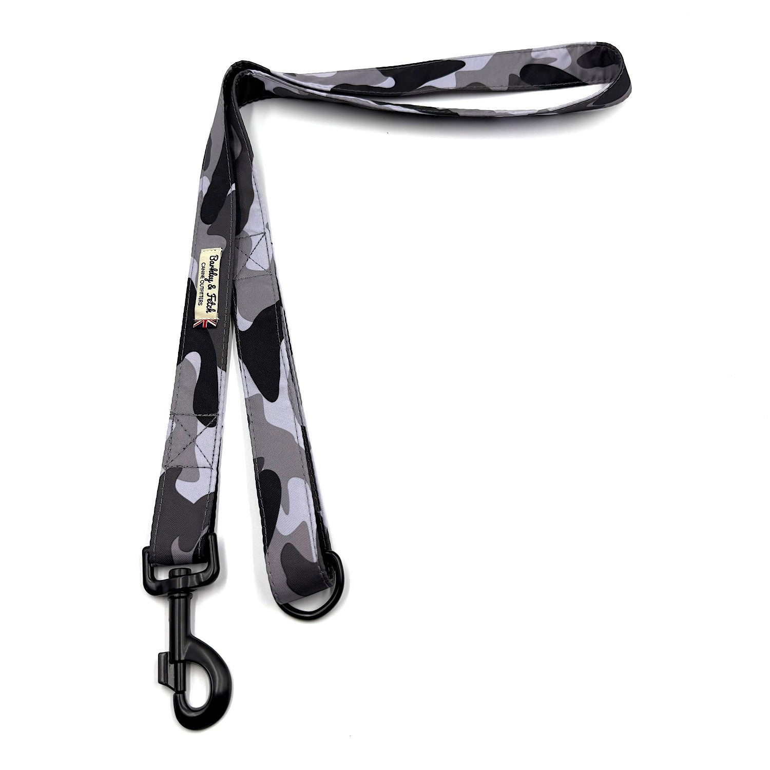 Camouflage-patterned dog leash with a black clip on a white background