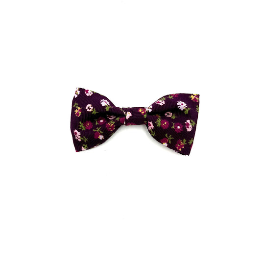Floral patterned bow tie on a white background