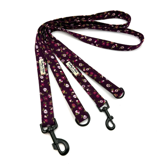 Floral patterned dog leash on a white background