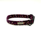Floral patterned dog collar with a barkley and fetch brand label on a white background