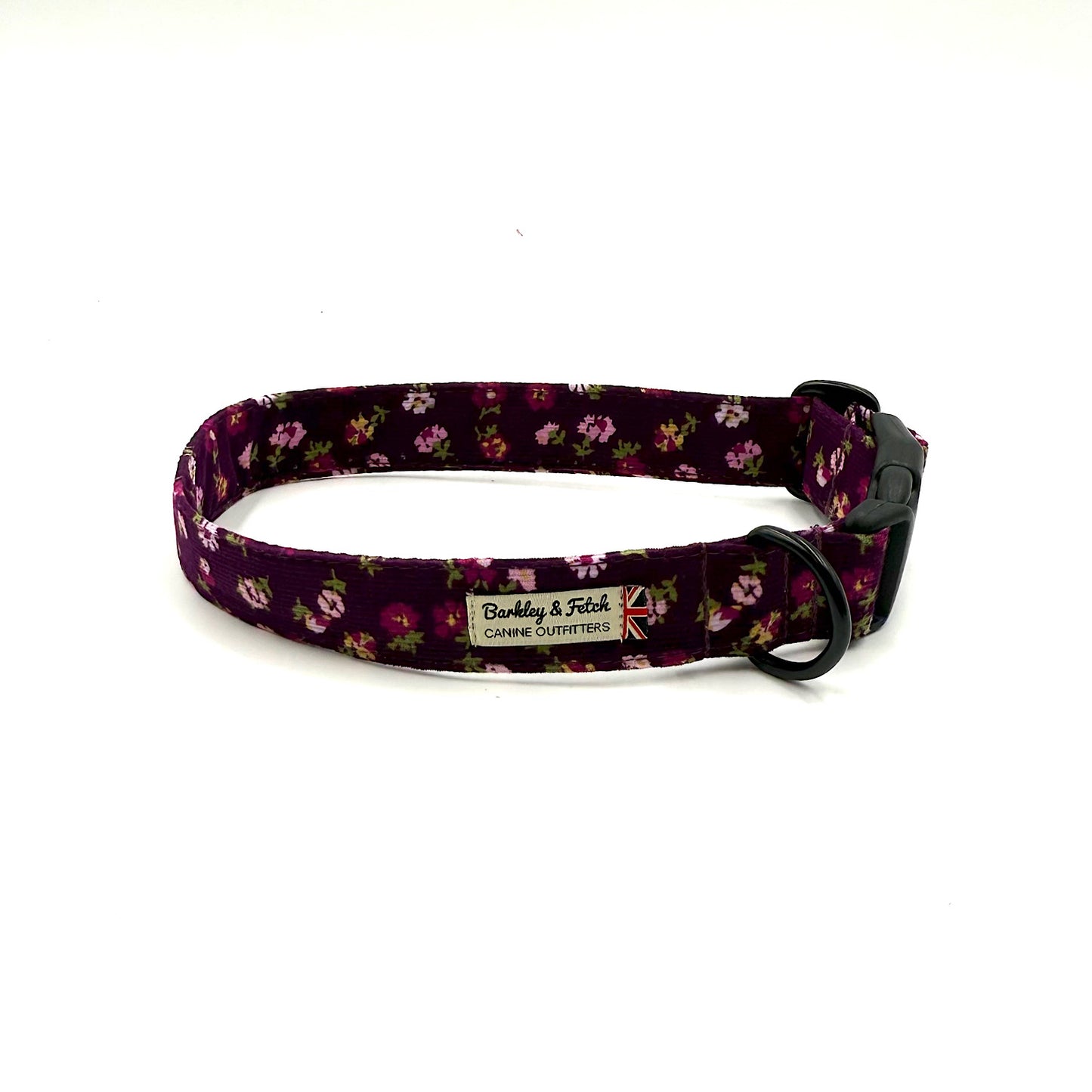 Floral patterned dog collar with a barkley and fetch brand label on a white background