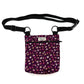 Floral-patterned pouch with a black strap on a white background