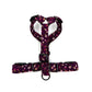 Floral-patterned dog harness on a white background