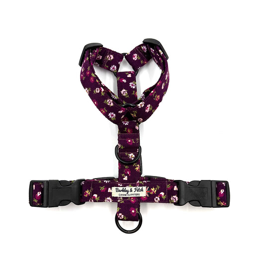 Floral-patterned dog harness on a white background