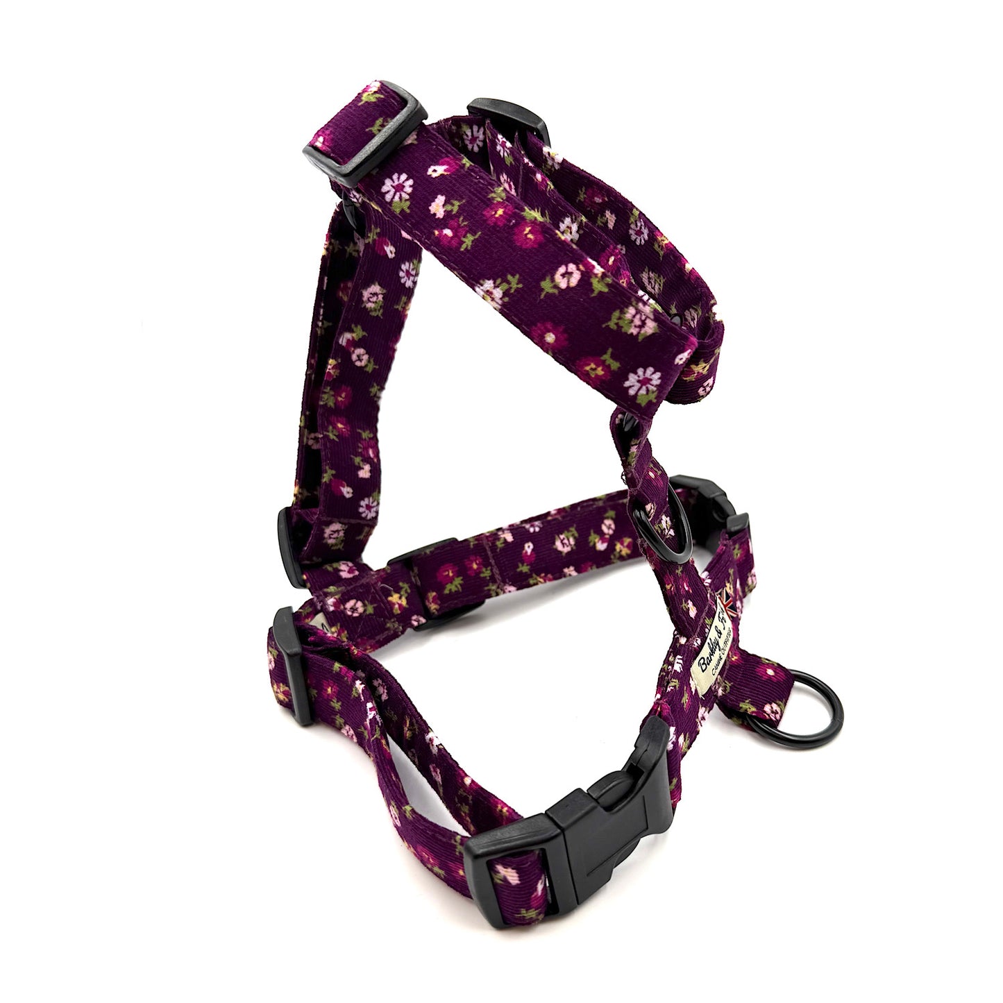 Floral-patterned dog harness on a white background