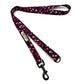 Floral patterned dog leash on a white background