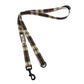 Plaid dog leash with a clip on a white background