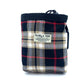 A black beige tartan dog treat bag with an elastic drawcord closure and a brand label shown on the front.