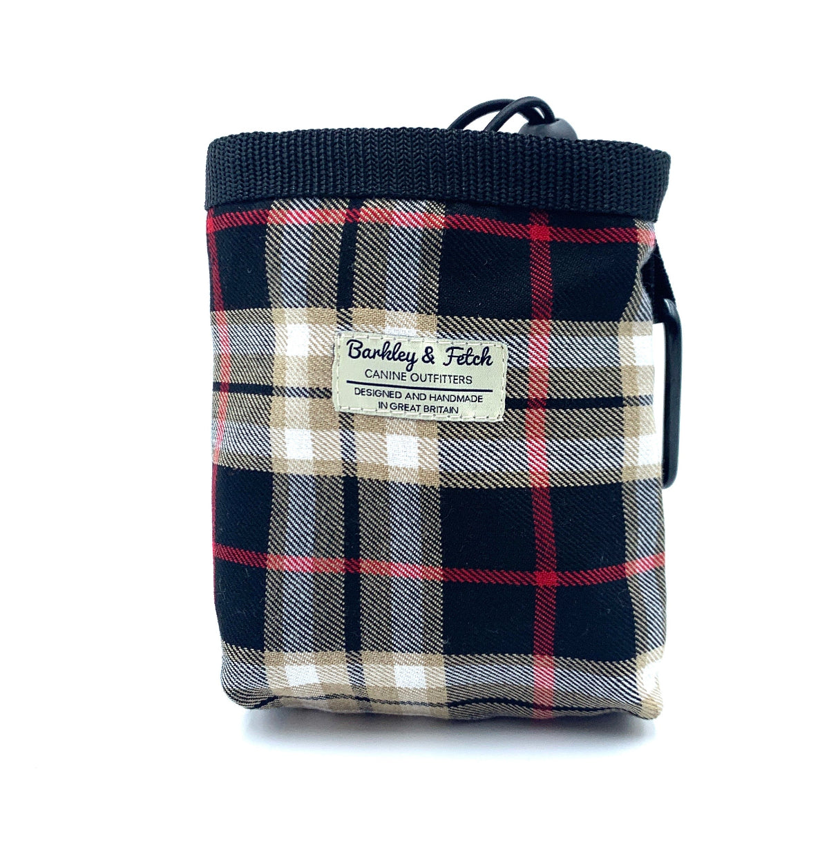 A black beige tartan dog treat bag with an elastic drawcord closure and a brand label shown on the front.