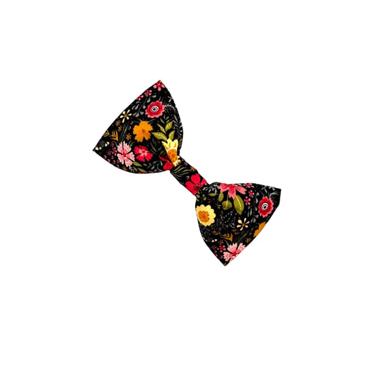 Floral patterned bow tie on a white background