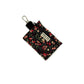Floral patterned keychain pouch on a white background