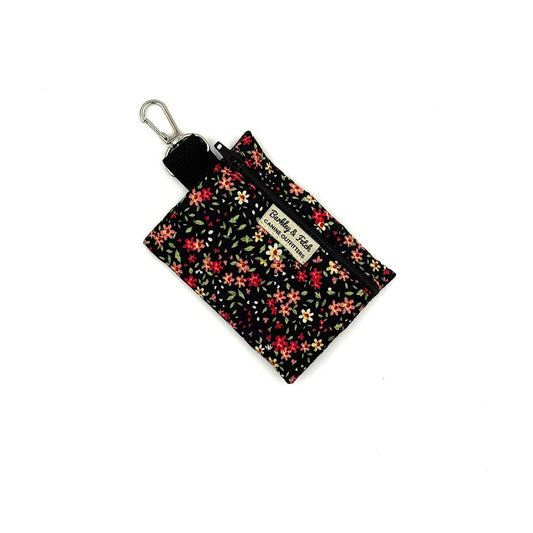 Floral patterned keychain pouch on a white background