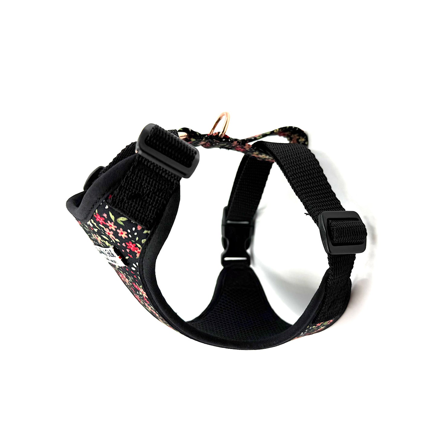 Floral-patterned dog harness on a white background