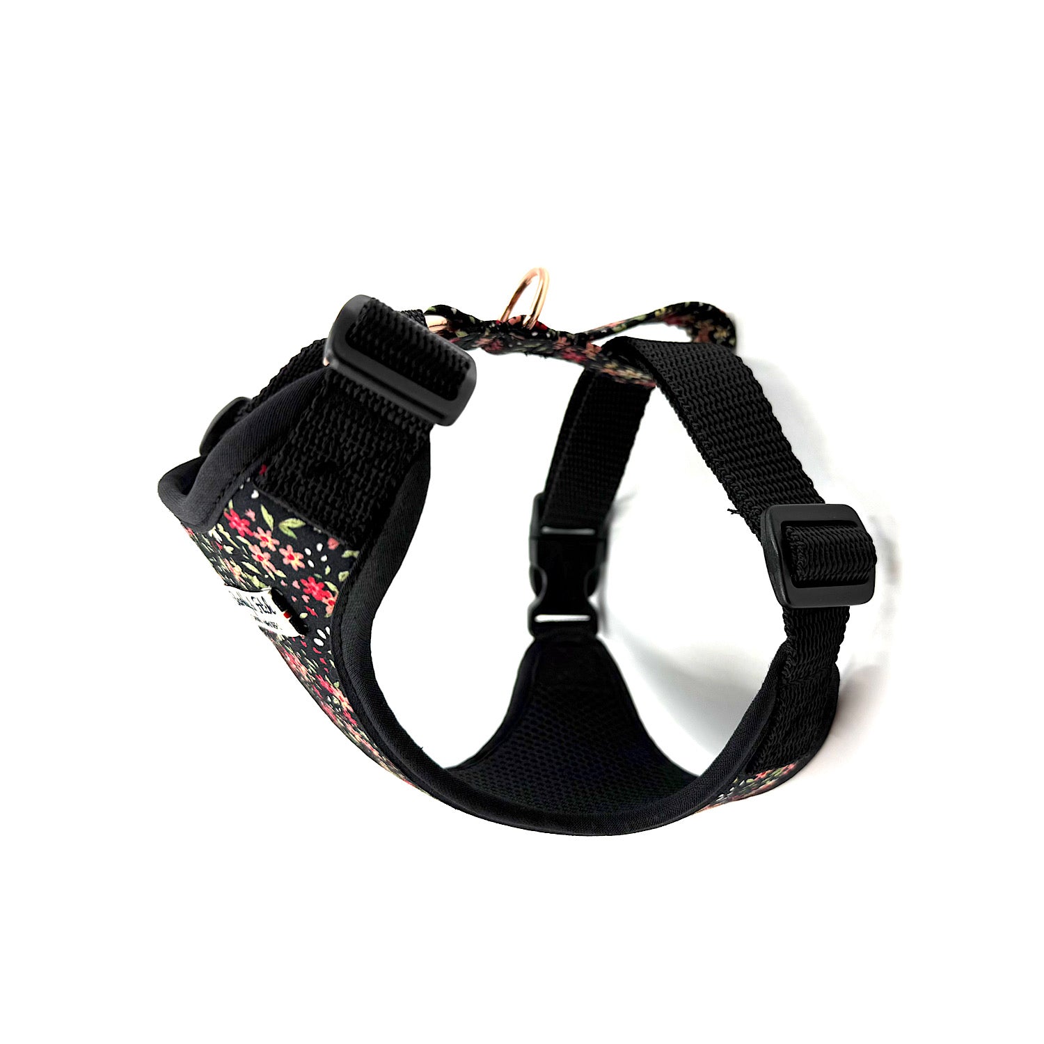 Floral-patterned dog harness on a white background