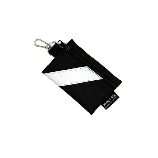 Black and white striped lanyard with a key ring on a white background