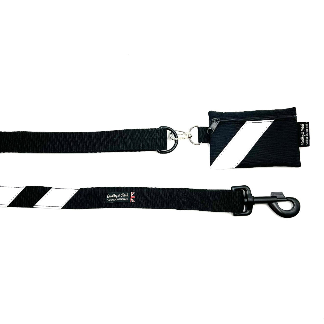 Black and white striped dog leash with a clip on a white background