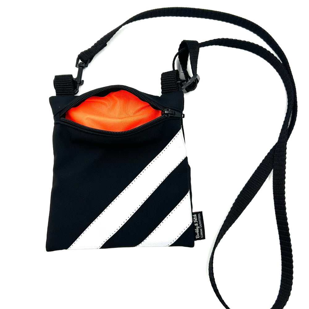Black and white striped pouch with orange interior on a white background British handmade by Barkley and Fetch