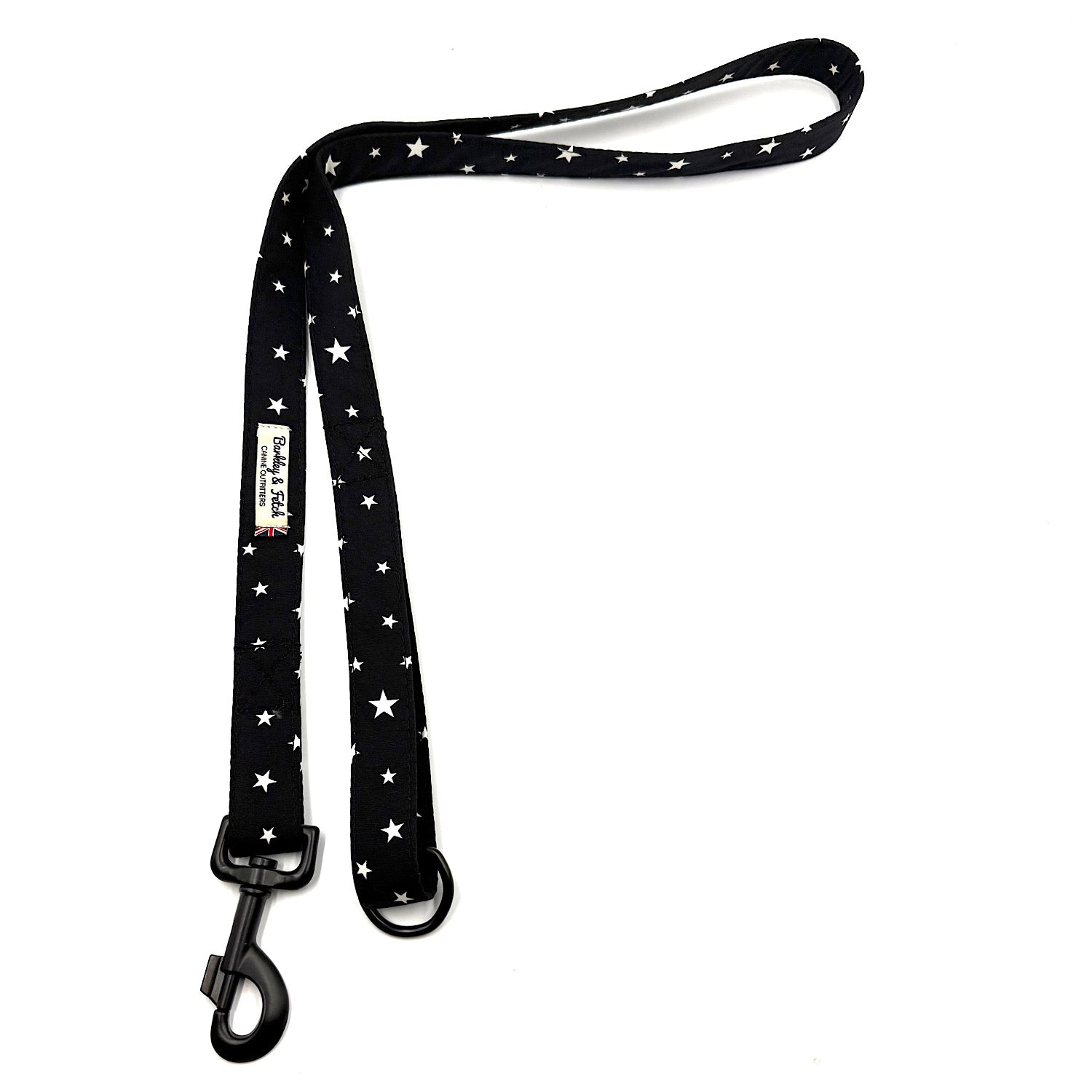 Black dog leash with white star pattern on a white background