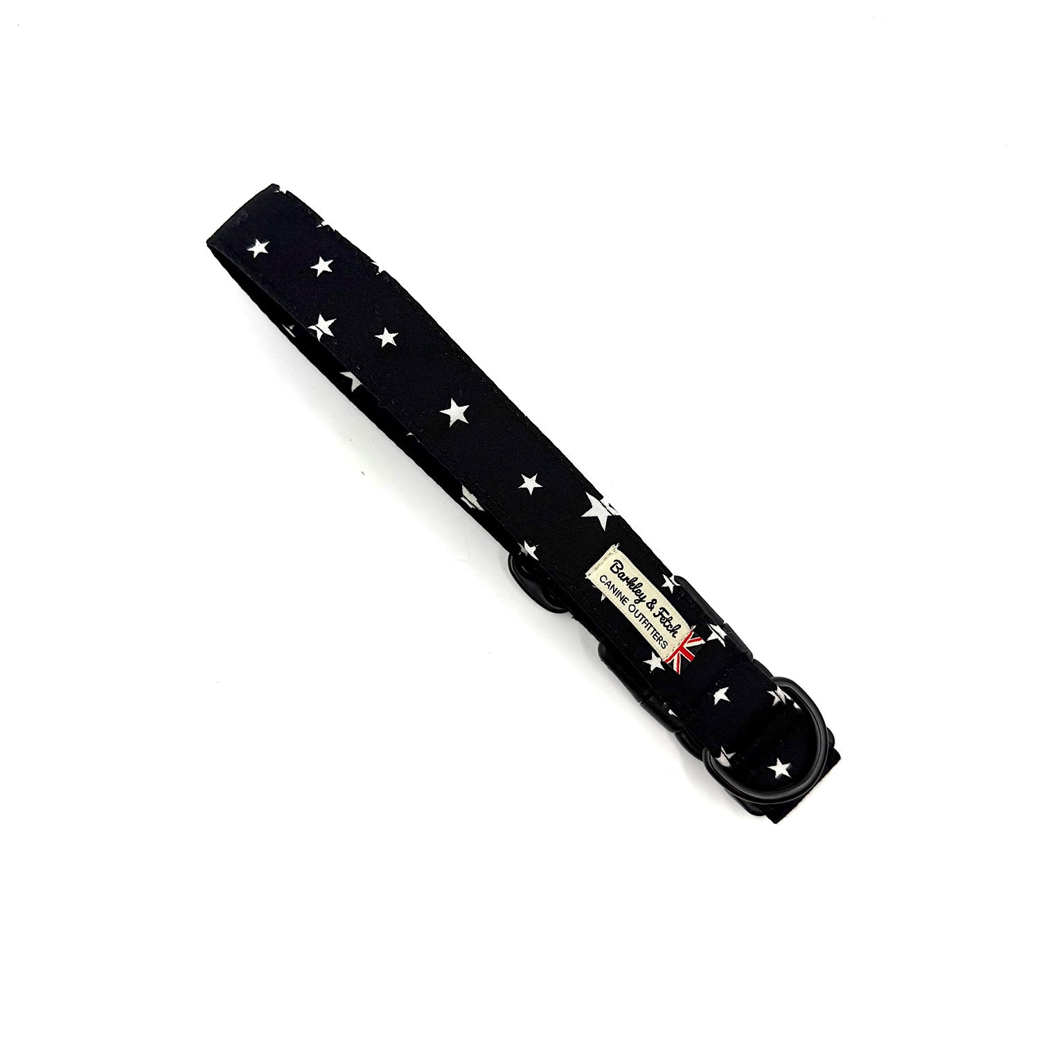 Black dog collar with white star pattern on a white background