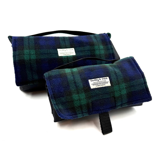 Two blue and green plaid settle mats with visible branding on a white background handmade in UK by Barkley And Fetch