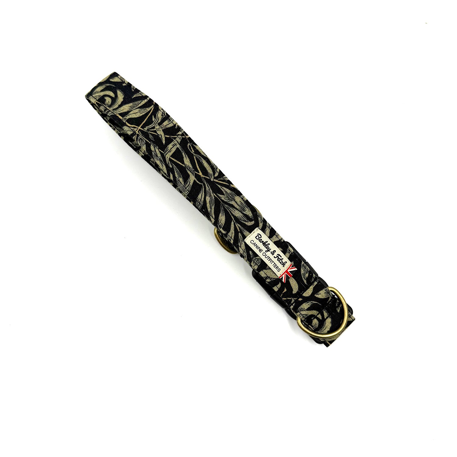 Black and gold patterned belt with a visible brand label on a white background