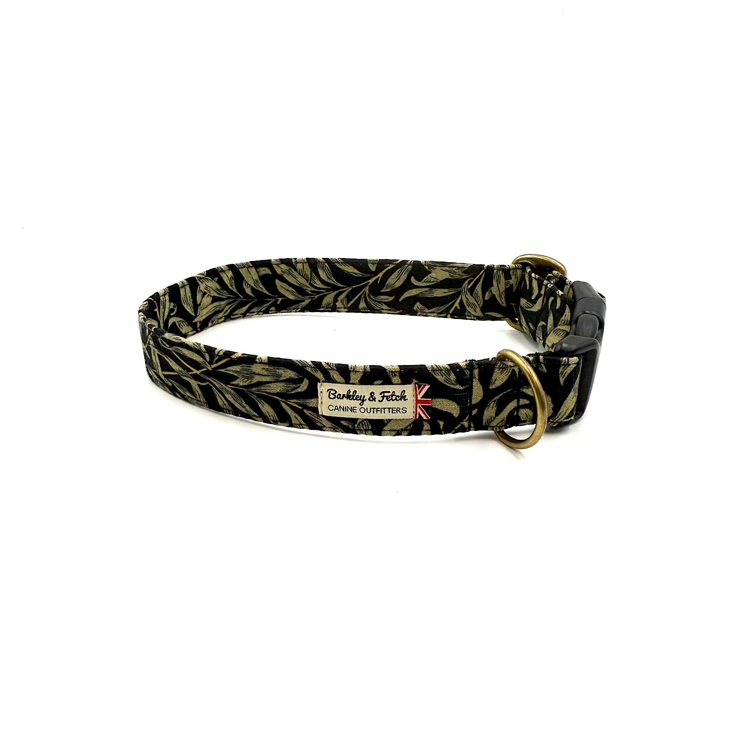 Dog collar with black and gold leaf pattern on a white background