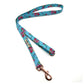 Floral patterned dog leash on a white background