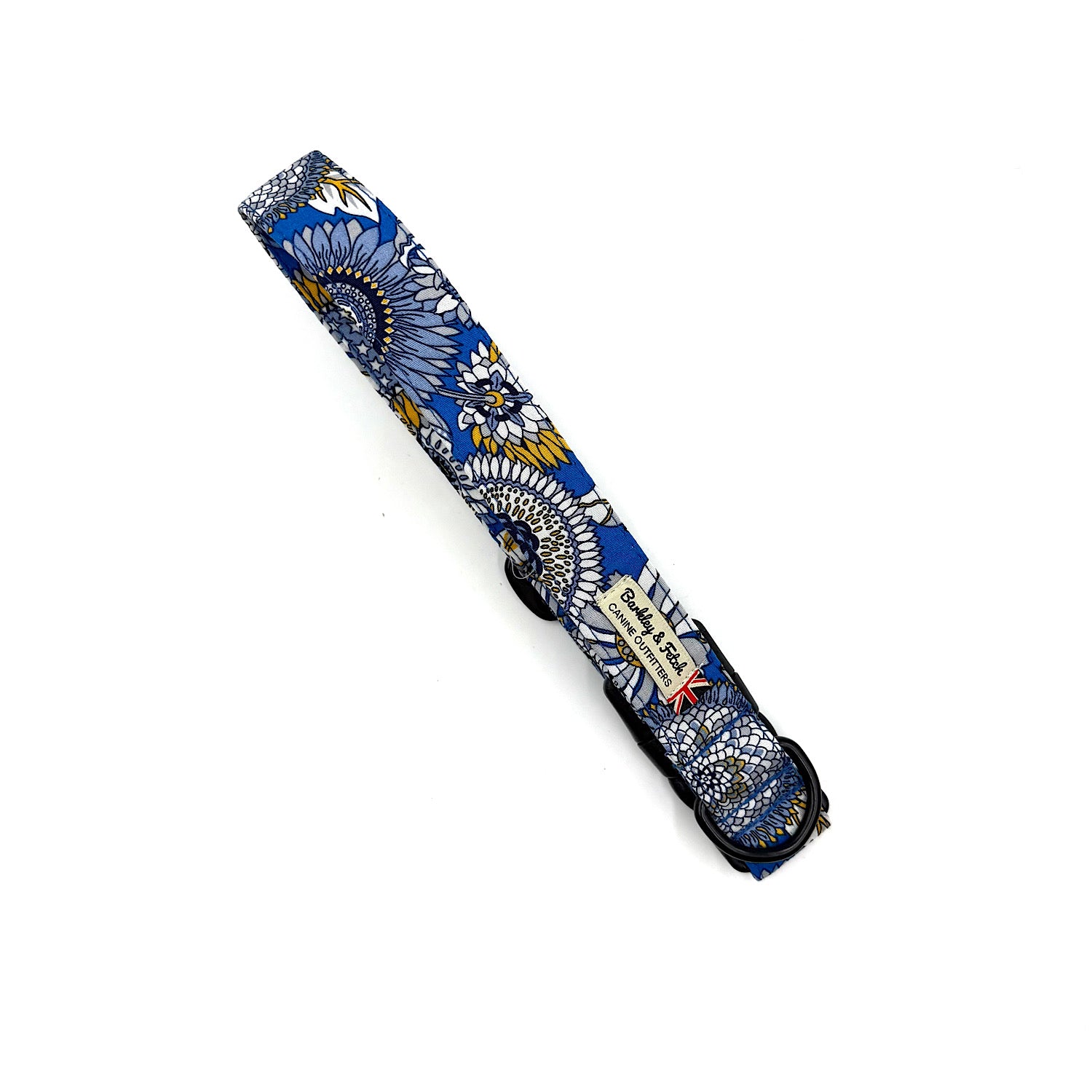 Decorative handmade dog collar with blue floral pattern on a white background