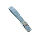 Light blue dog collar with a brand tag on a white background