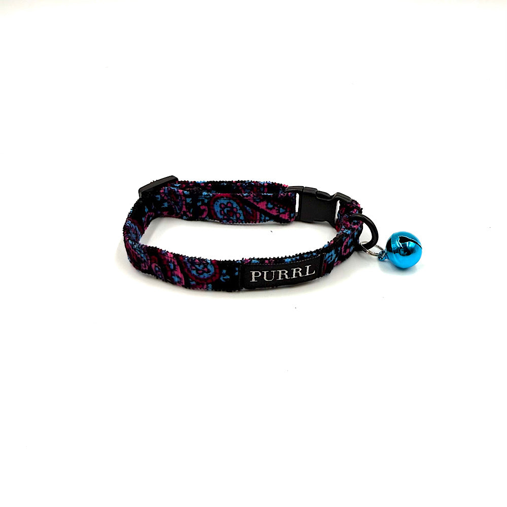 Cat collar with colorful paisley pattern and blue bell on a white background handmade in UK by Barkley And Fetch