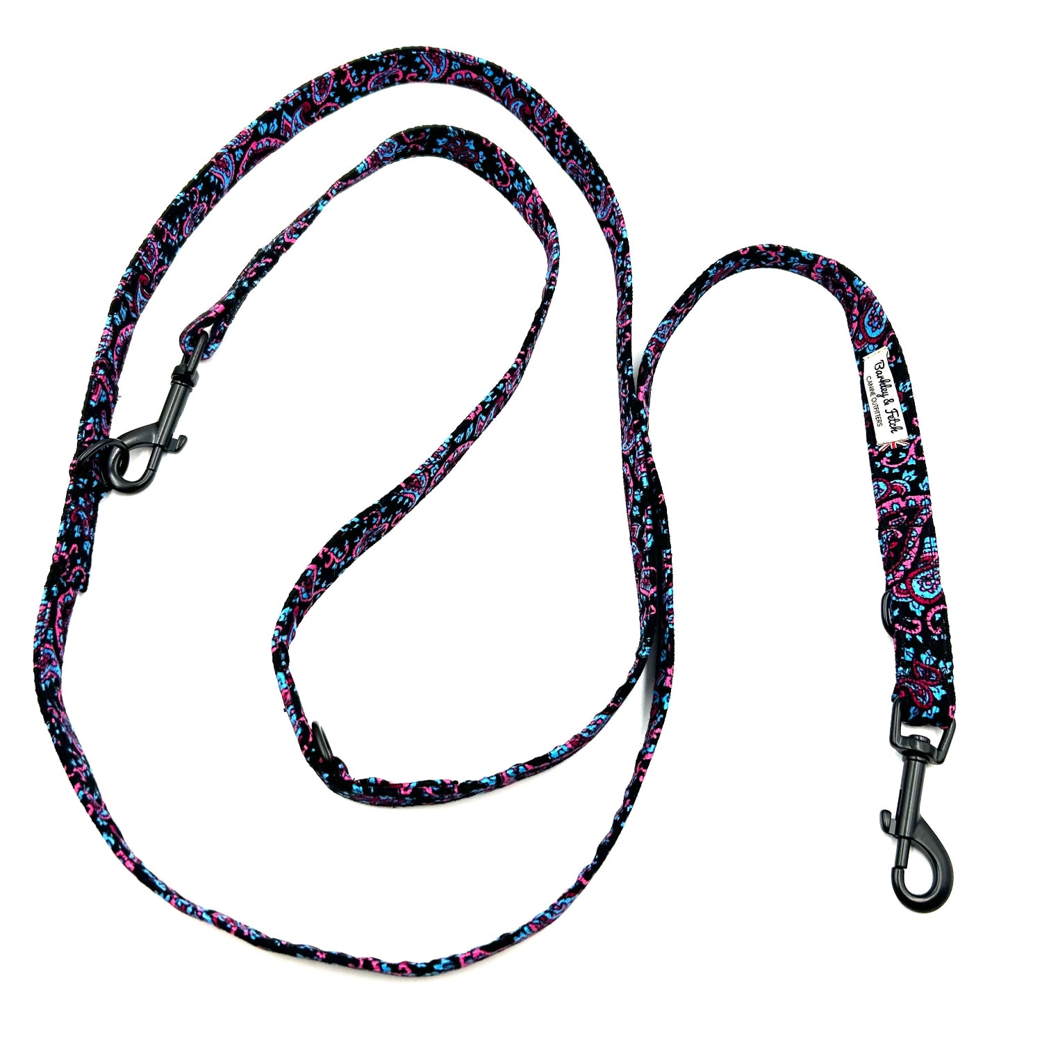 Multicolored patterned dog leash on a white background