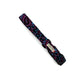 Decorative dog collar with colorful paisley pattern on a white background