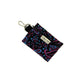 Small pouch with paisley pattern and keychain clip on a white background