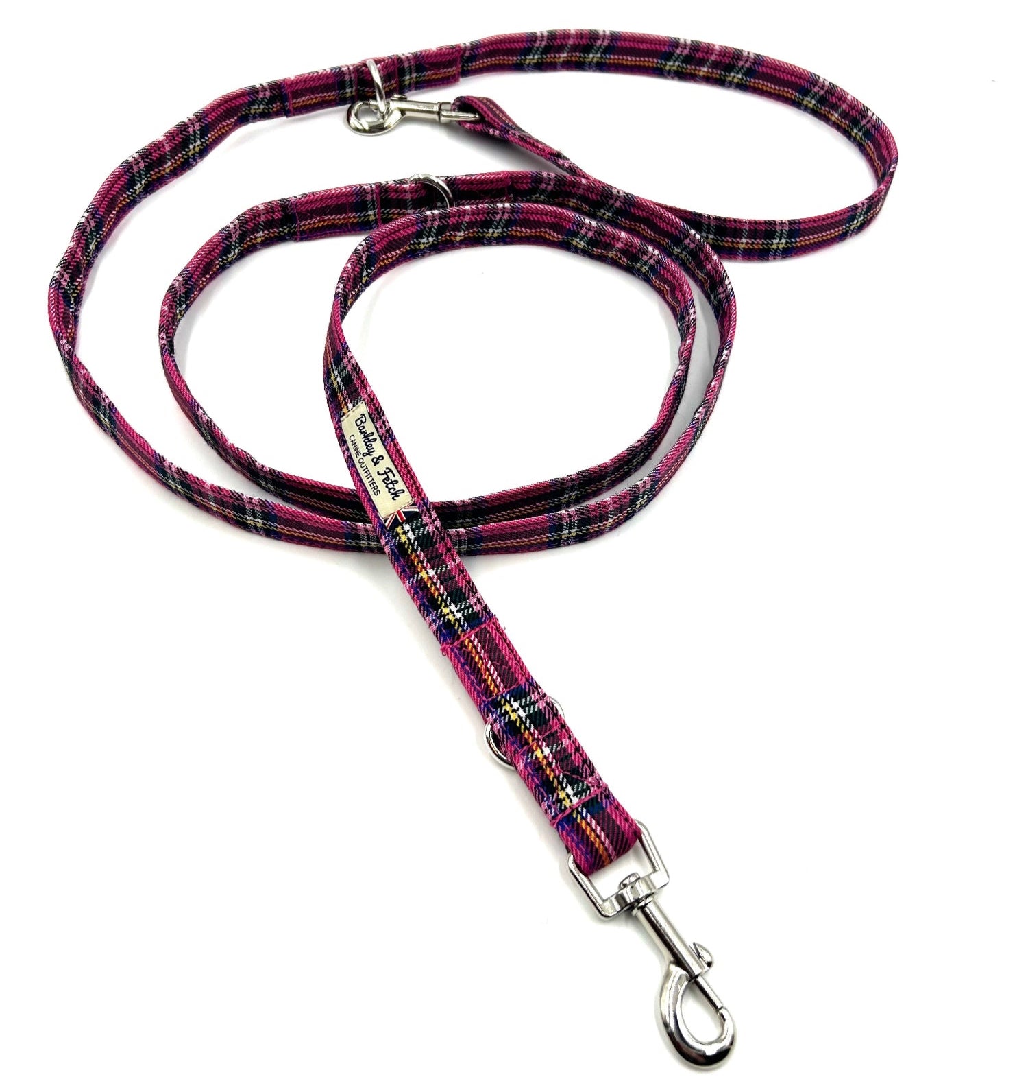 Plaid dog leash with metal clip on a white background