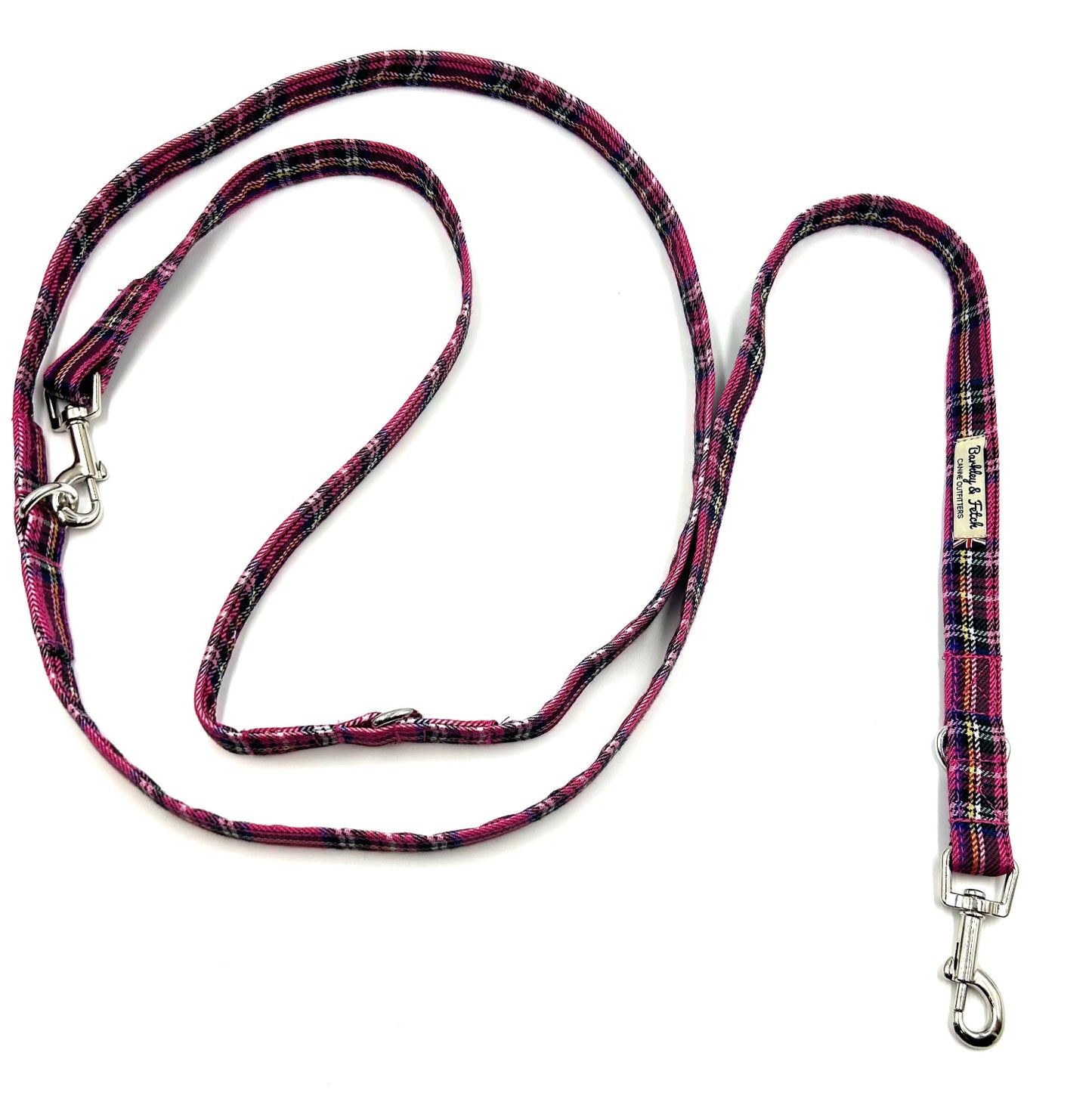 Plaid patterned dog leash on a white background