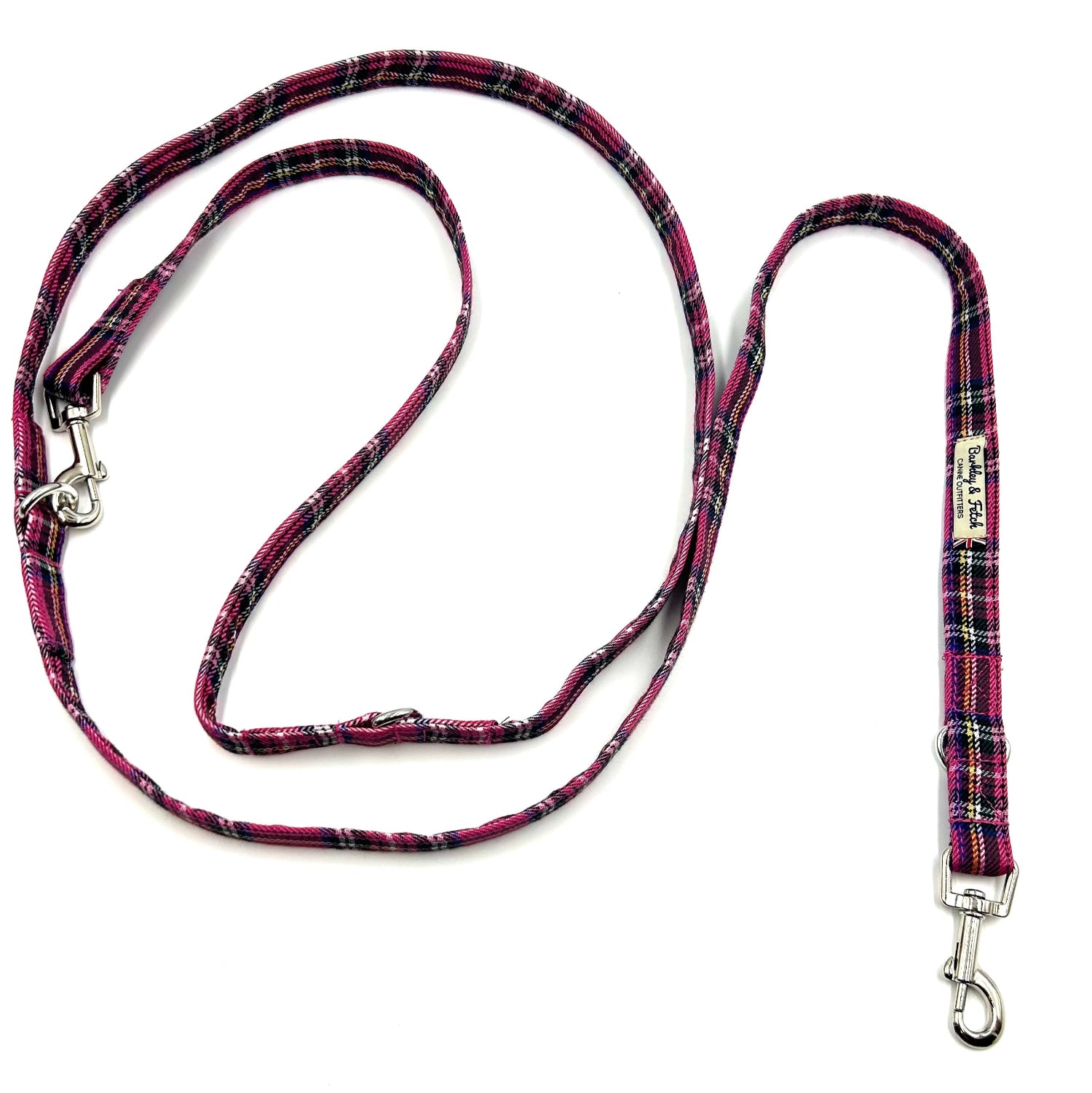 Plaid patterned dog leash on a white background