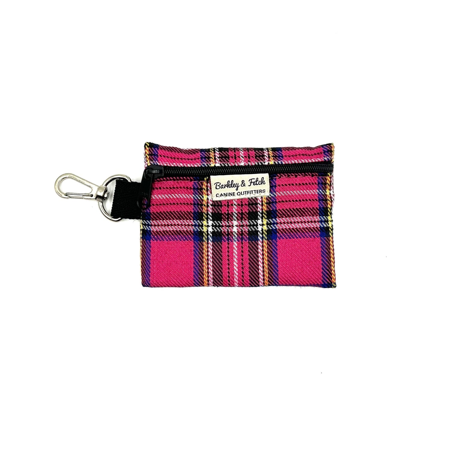 A bright pink tartan print poo bag holder with a metal clip.