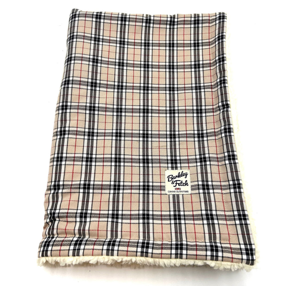 A caramel tartan dog blanket with sherpa backing on a white background handmade by Barkley and Fetch of Great Britain