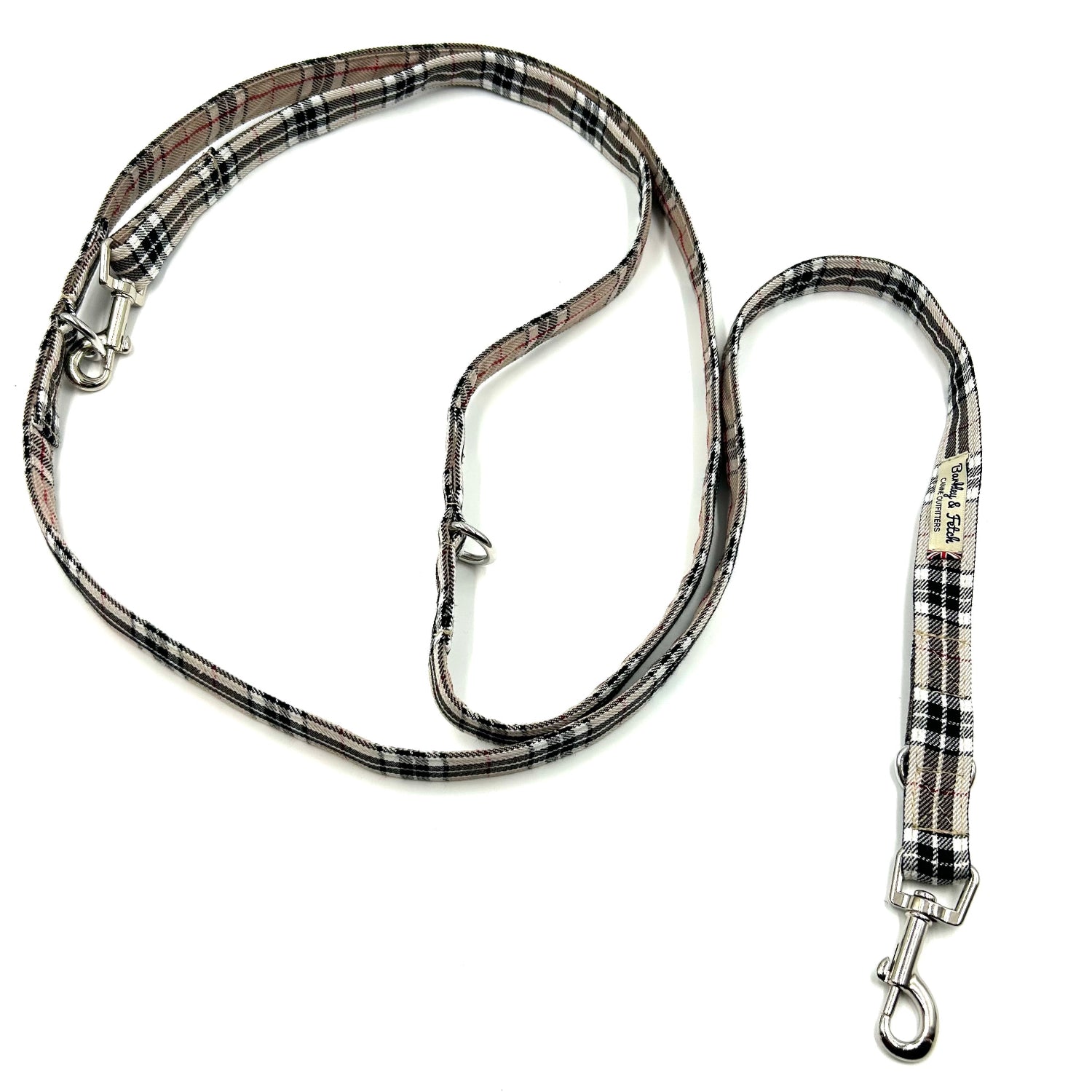 Plaid patterned dog leash on a white background