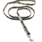 Plaid patterned dog leash on a white background