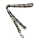 Plaid dog leash with metal clip on a white background