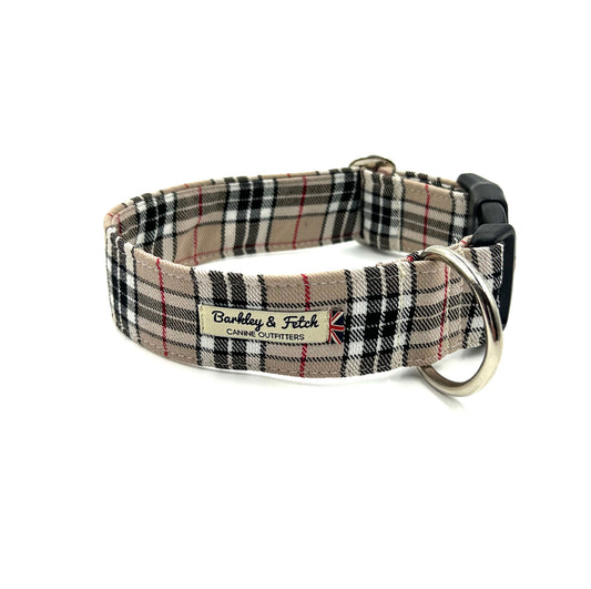 A wide dog collar with a plaid pattern, featuring a strong polyester webbing, secure clip fastening, and a heavy-duty d-ring.