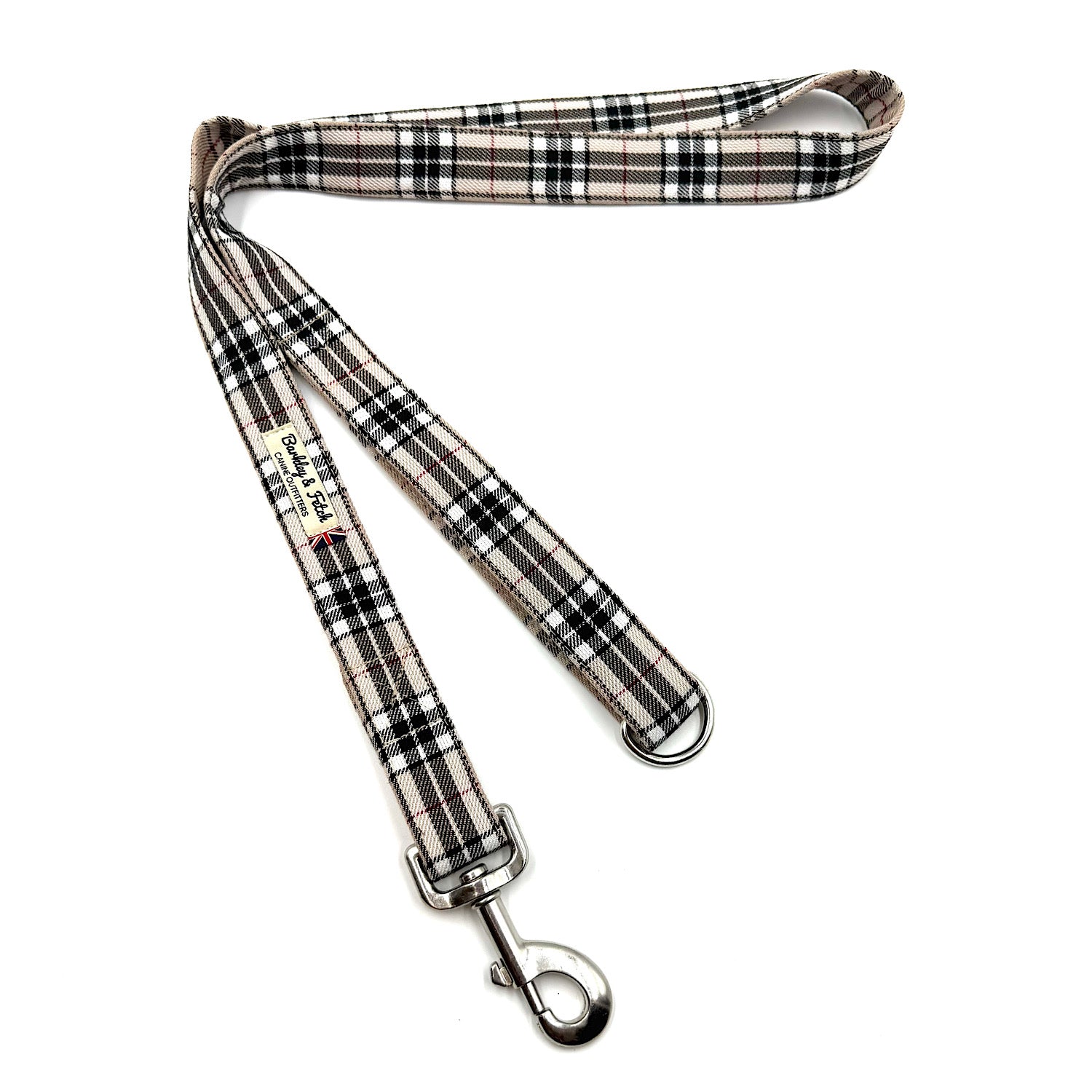 Plaid patterned dog leash on a white background