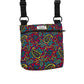 Colorful paisley-patterned bag with black straps on a white backgroundHANDMADE IN UK BY BARKLEY AND FETCH