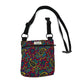Colorful paisley-patterned bag with a black strap on a white background HANDMADE IN UK BY BARKLEY AND FETCH